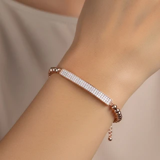 צמיד פלטה כדורים רוז גולד משובץ