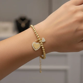 צמיד כדורים ותליוני לב גולדפילד בחריטה אישית דגם H1