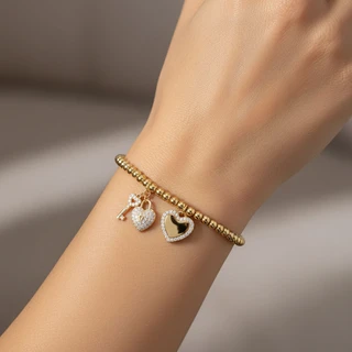 צמיד כדורים ותליוני לב בציפוי זהב בחריטה אישית דגם B3